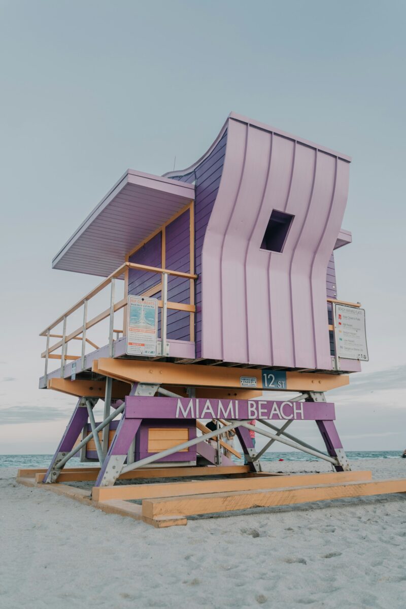 A lifeguard stand on Miami Beach under a gray, overcast sky