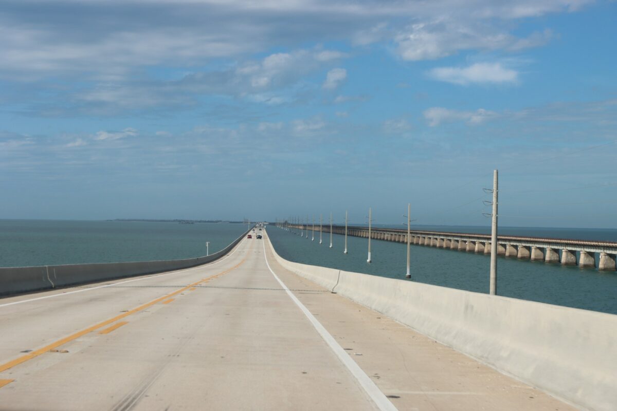 The Overseas Highway running across the water in the Florida Keys, with an old bridge alongside
